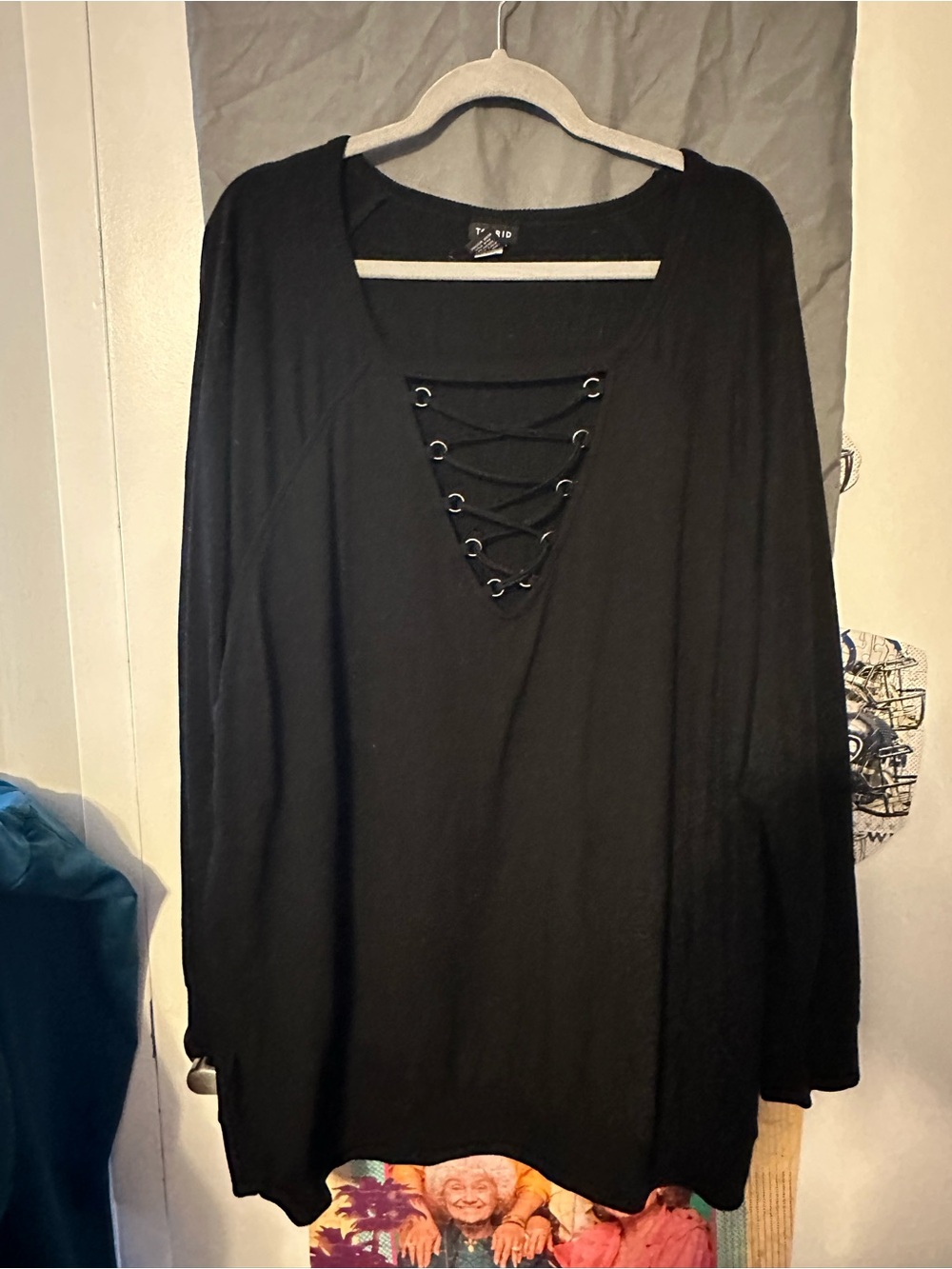 Black long sleeve lace-up v-neck knit tBlack long sleeve lace-up v-neck knit top